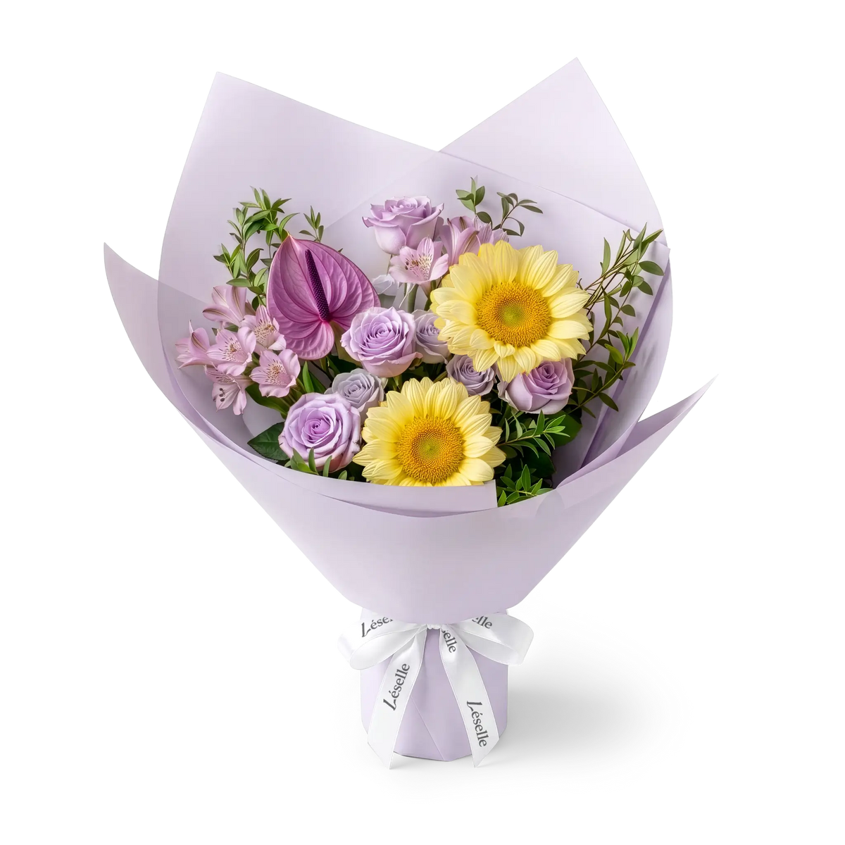 A wrapped flower bouquet featuring cream-color sunflowers, lavender roses, a purple anthurium, and green foliage, wrapped in a lavender paper sleeve with a white ribbon, on a transparent background.